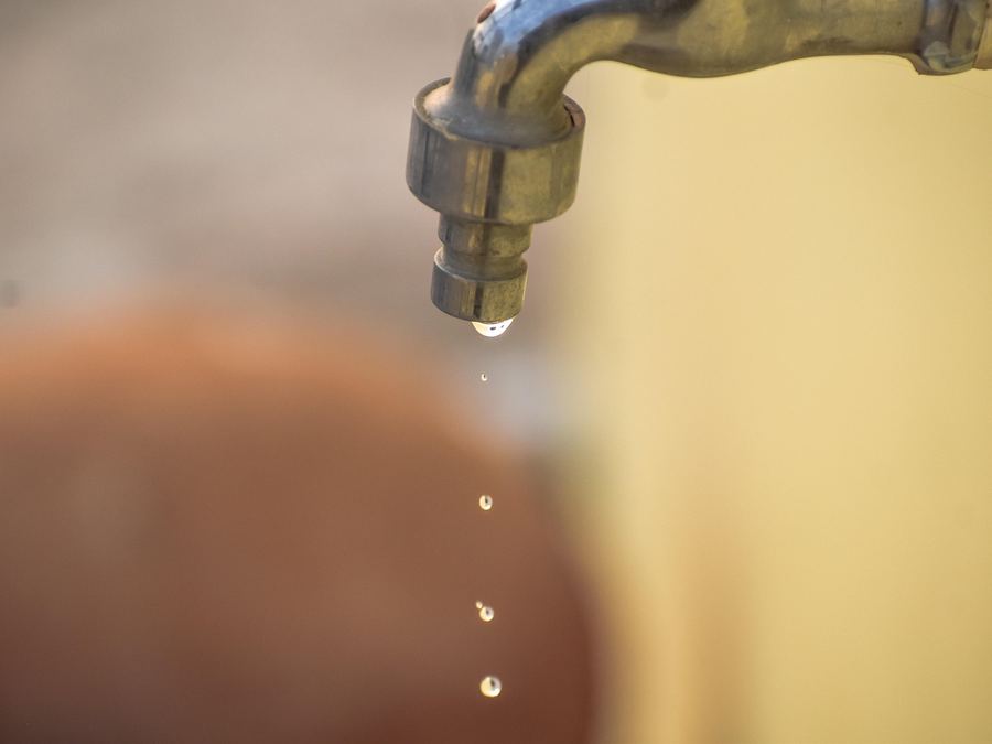 Stock photo of a dripping faucet