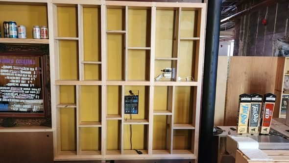 The same custom display shelving from another angle, built by Staged Right Carpentry