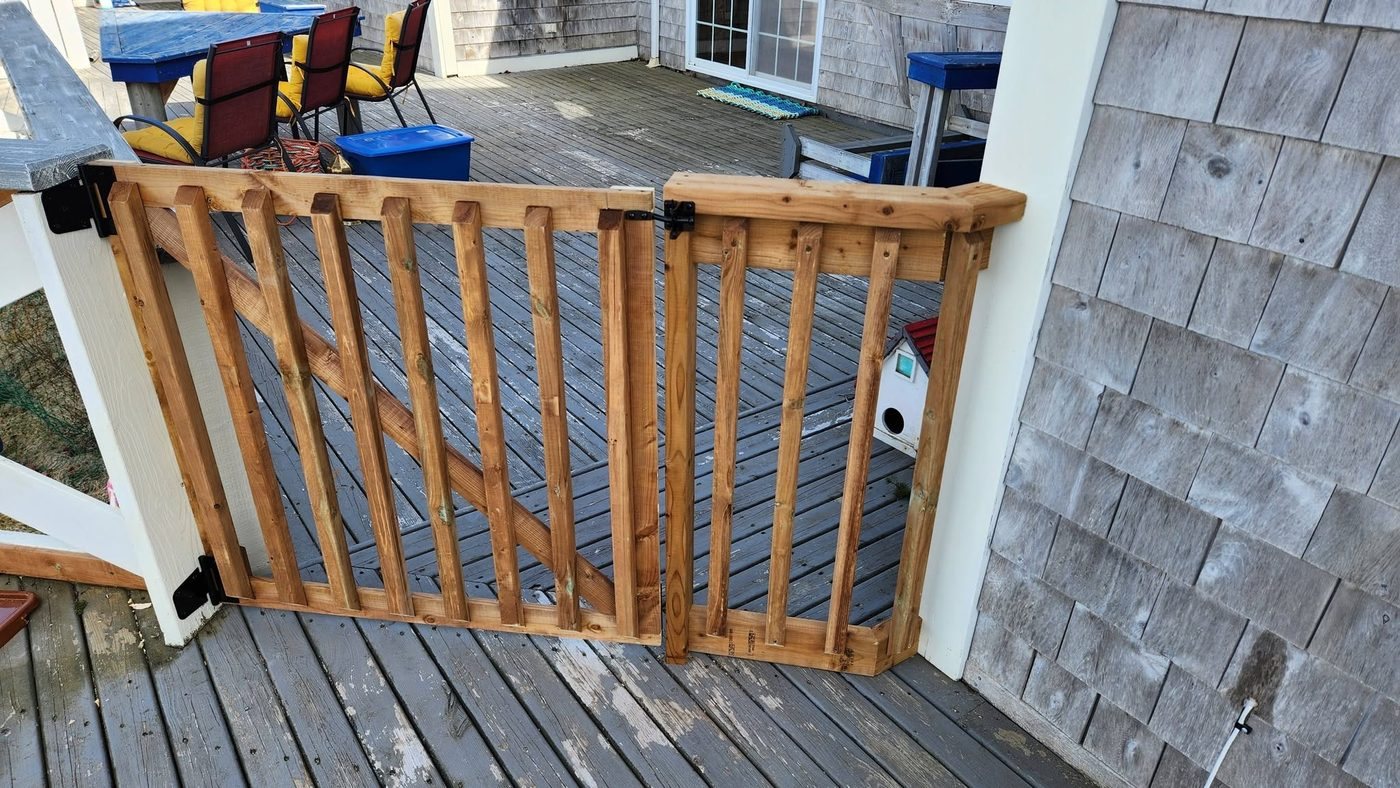 Custom wood deck gate with latch hardware, built by Staged Right Carpentry